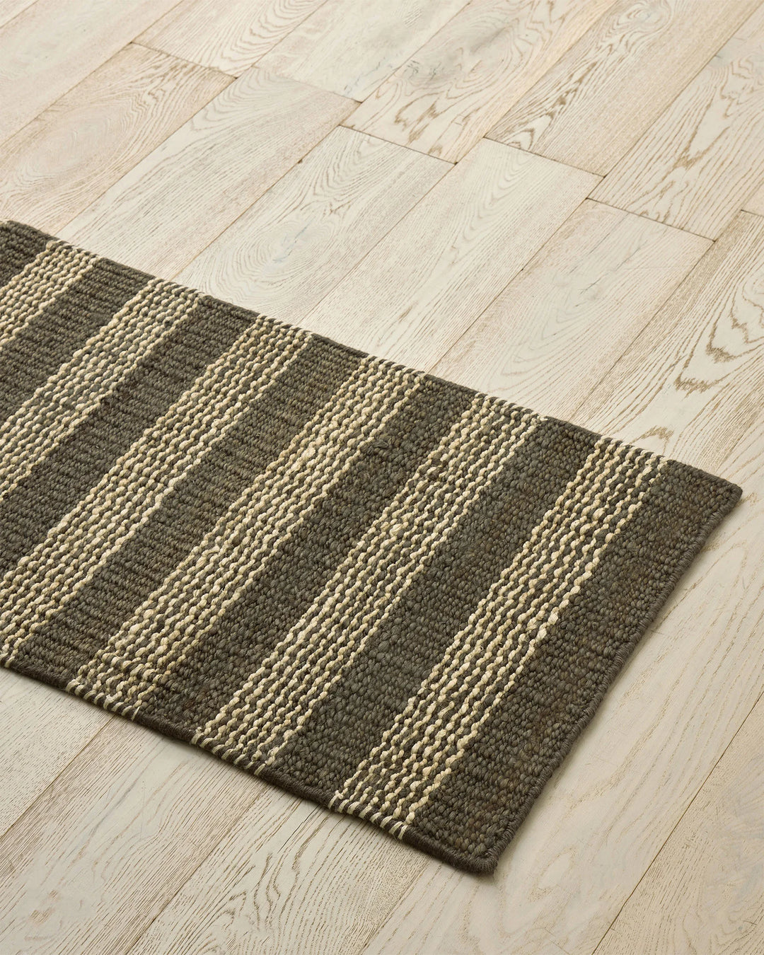 Arden Coal hand-woven jute door mat featuring charcoal and ecru stripe pattern, 65x120cm, by Weave Home