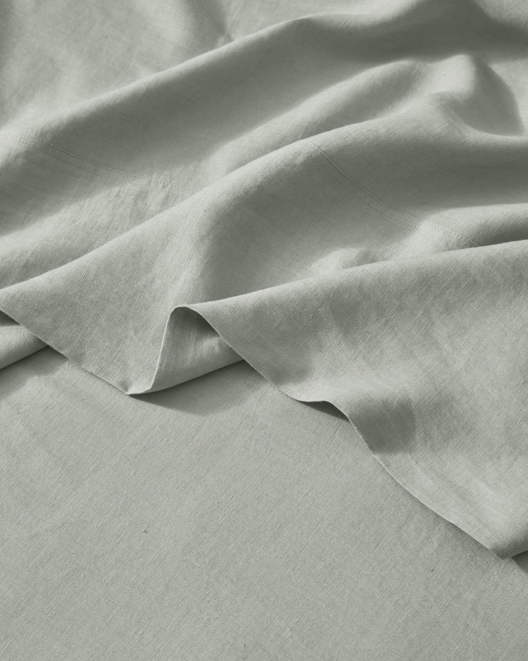 Ravello Flat Sheet in sage, European linen with soft prewashed finish and relaxed drape by Weave Home