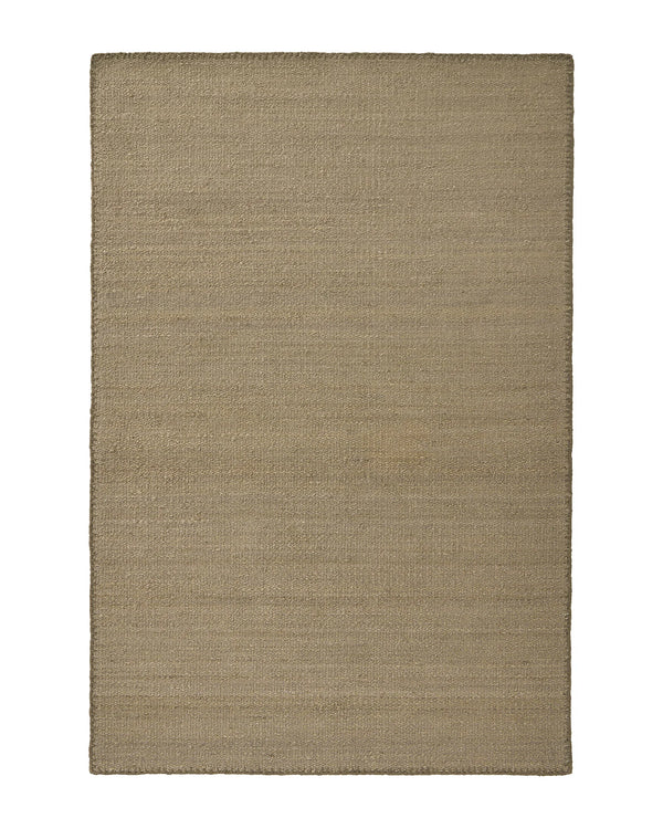 Monroe Flint rug in soft earthy green with muted grey undertones, woven polyester with blanket stitch detail, by Weave Home