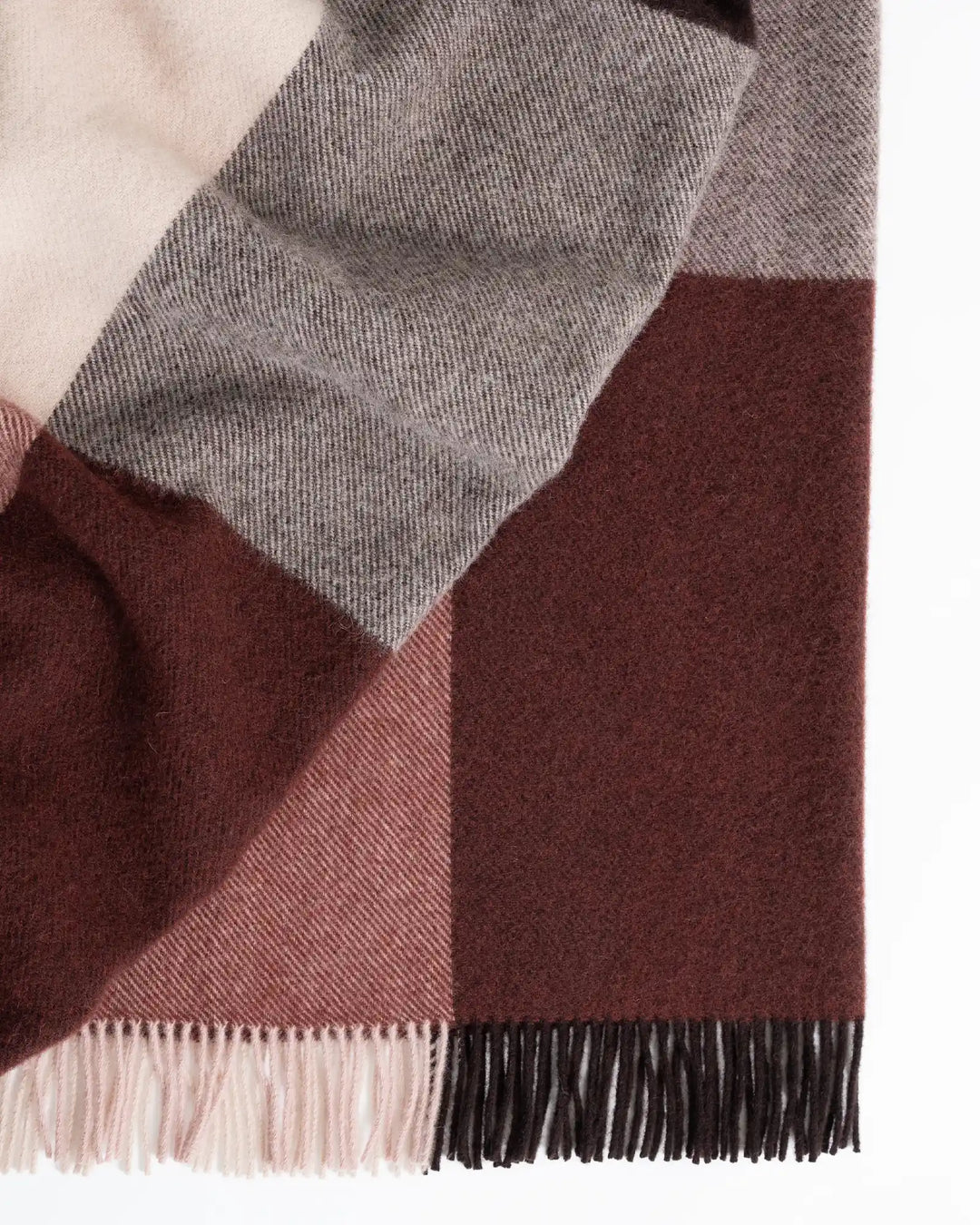 Syracuse Brookside Beetroot throw in berry, chocolate and pink with large check pattern and fringed edge by Weave Home
