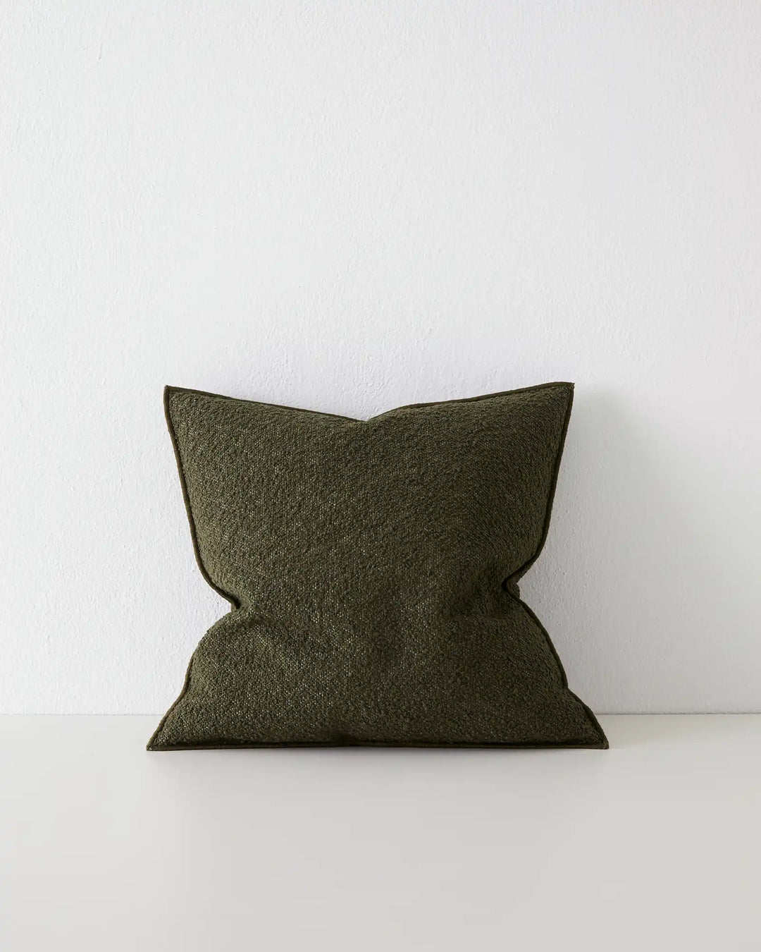 Alberto Olive 50x50 bouclé cushion with soft textured weave and babylock edge, front view by Weave Home