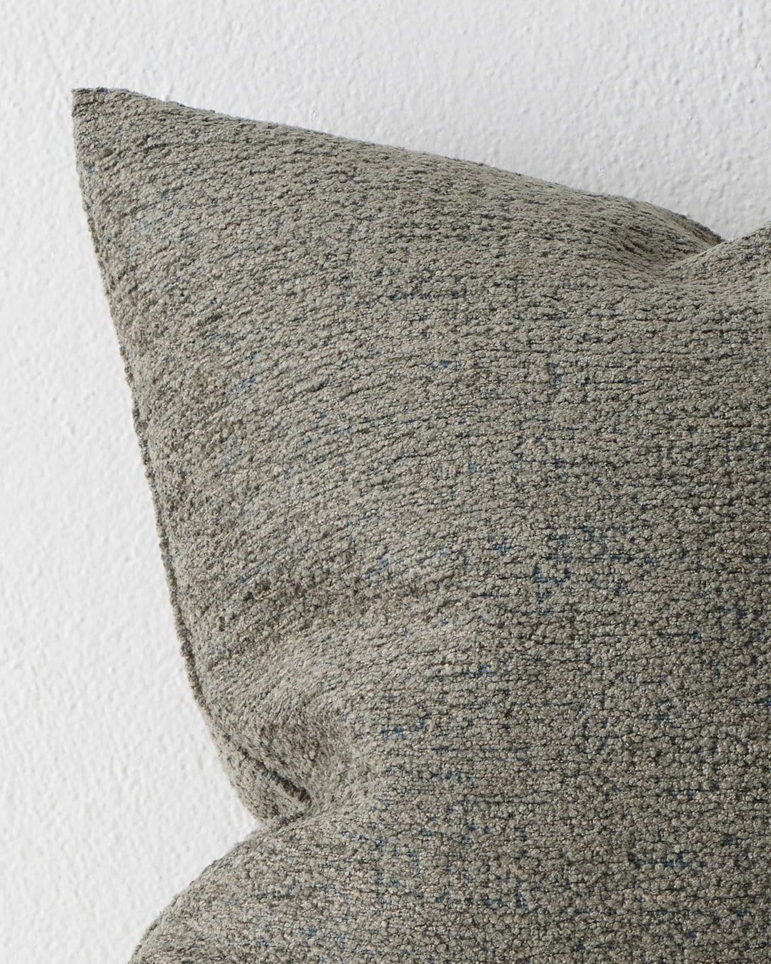 Laurent Moss cushion close-up, showing textured viscose blend weave with subtle blue undertones, 50x50cm by Weave Home
