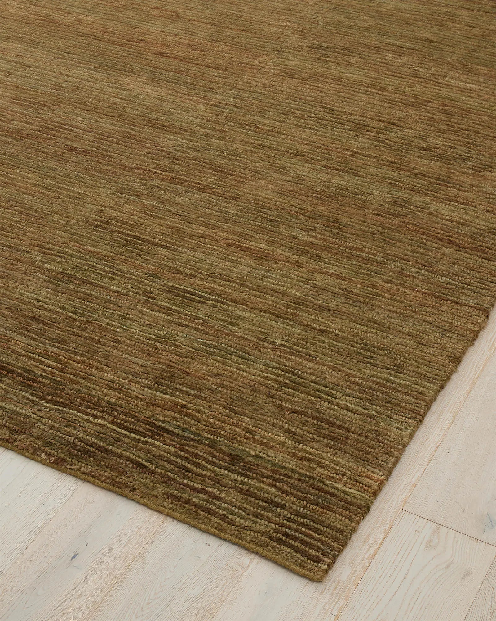 Bastian Oakmoss rug corner detail, textured 200x300 jute with looped and cut pile design by Weave Home
