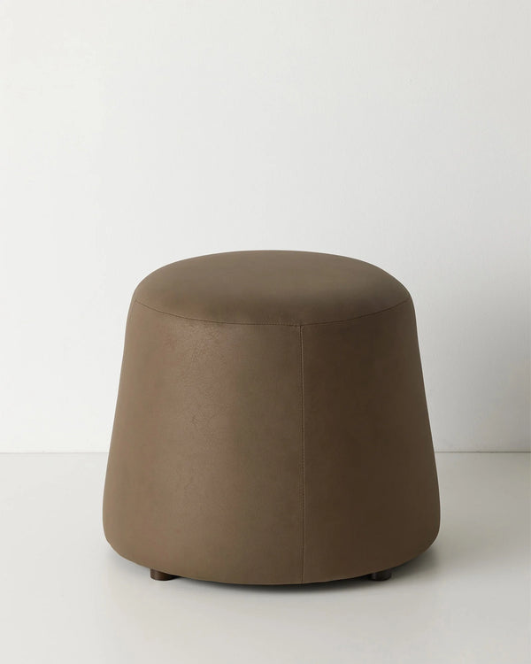 Landro Mocha ottoman in warm chocolate brown with soft leather-look polyester upholstery and sculptural dome shape by Weave Home