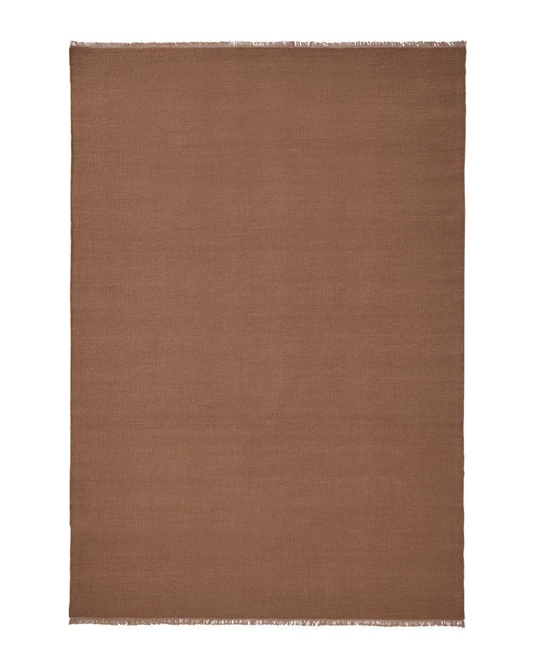 Jacqueline Rosewood wool flatweave rug with frayed edge detail in dusty rose and warm brown tones by Weave Home