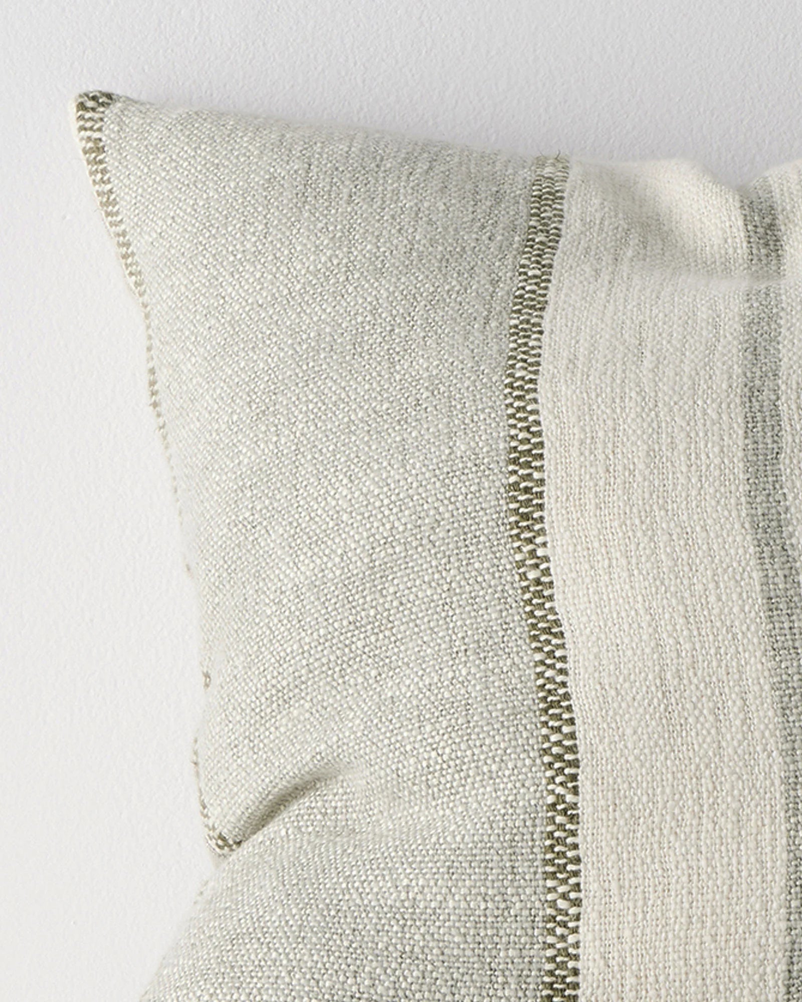 Ottavio Lagoon cushion close-up, seafoam and cream linen-polyester blend with moss green stripe detail and concealed zipper by Weave Home