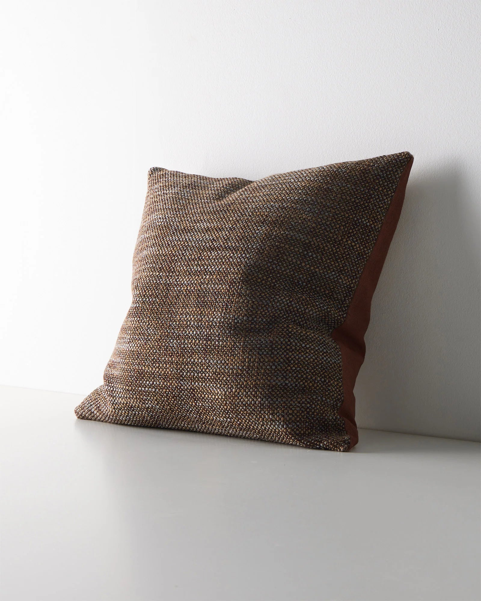 Castel Auburn cushion with chunky space-dyed weave in burgundy, terracotta, honey and grey tones by Weave Home