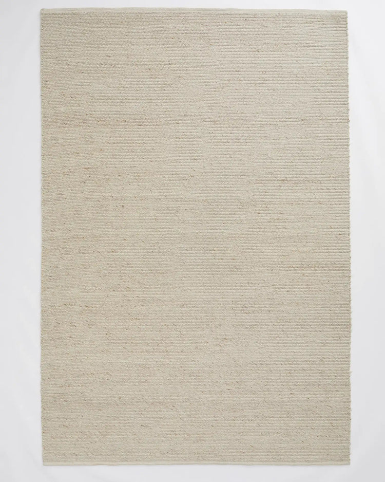 Andes Sandstorm rug in natural cream, hand-woven wool-cotton blend with ribbed texture design by Weave Home