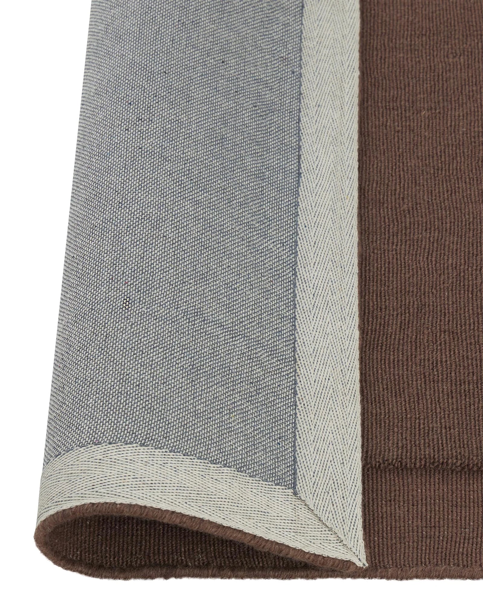 Cassio Mulberry rug, 100% NZ wool loop pile with contrasting serged edge and lowered border detail, by Weave Home