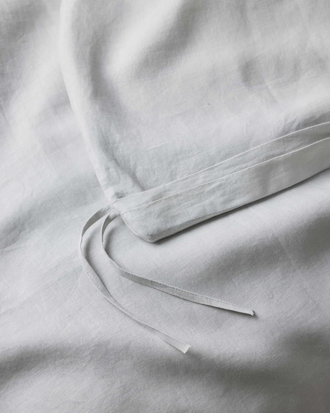 Ravello Quilt Cover Silver detail shot showing internal linen ties that secure quilt placement by Weave Home