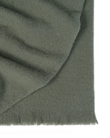 Hyde Oregano wool blend throw in sage green, detail of brushed weave and fringed edge, by Weave Home