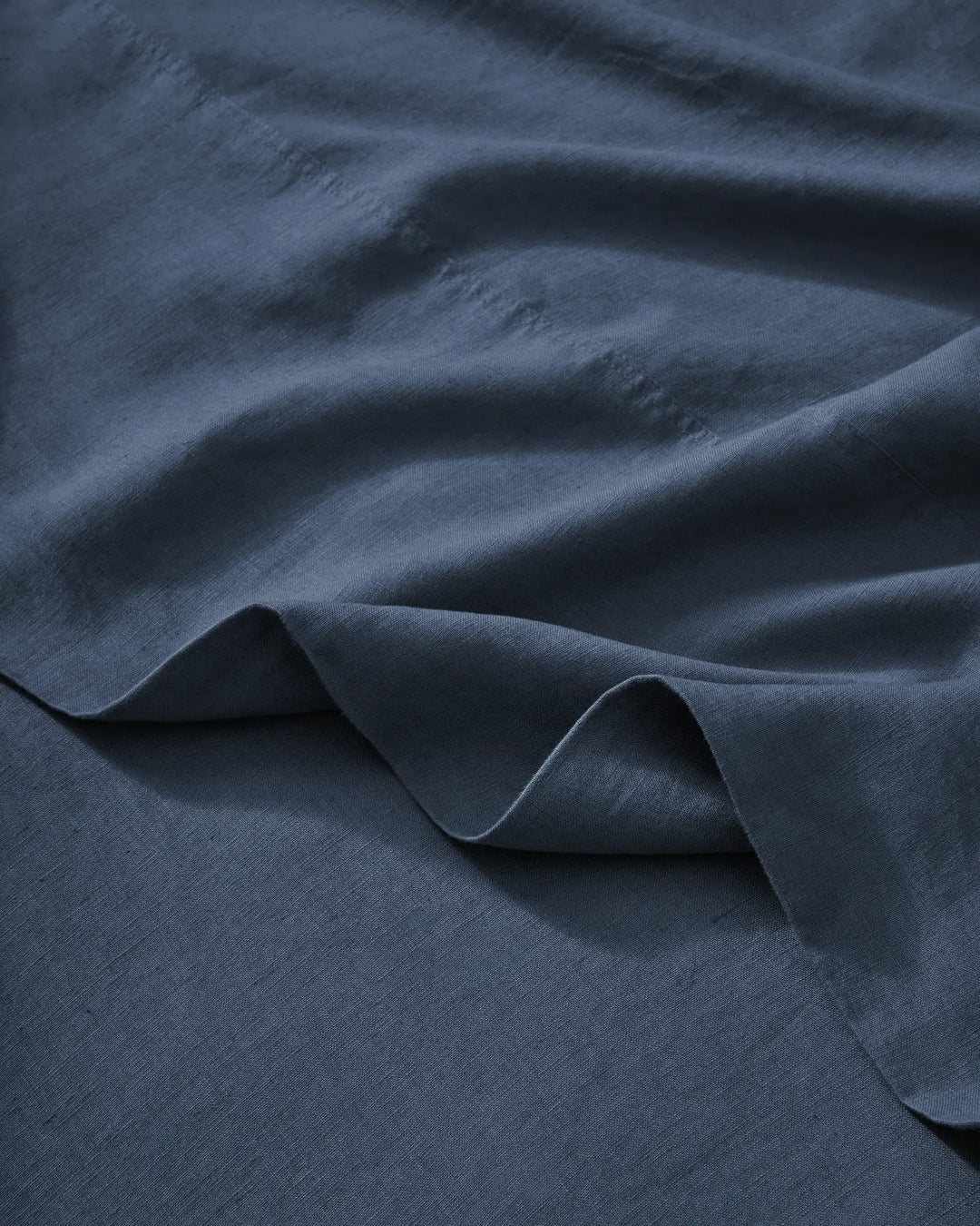 Ravello Flat Sheet in Denim, soft European linen with relaxed, aero-finished weave texture by Weave Home