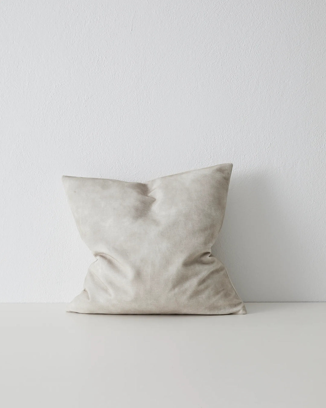 Ava Ecru 50x50 cushion in bone white polyester with velvet-like texture and concealed YKK zip by Weave Home