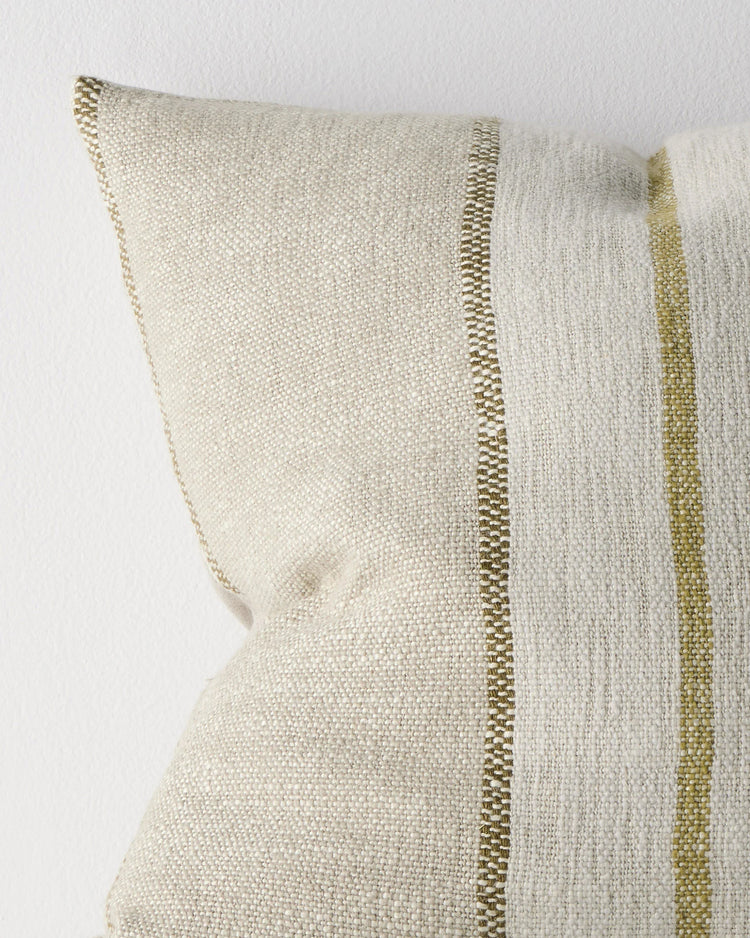 Ottavio Willow cushion close-up detail showing chunky slub weave with olive and lime striped piping against cream linen polyester blend by Weave Home