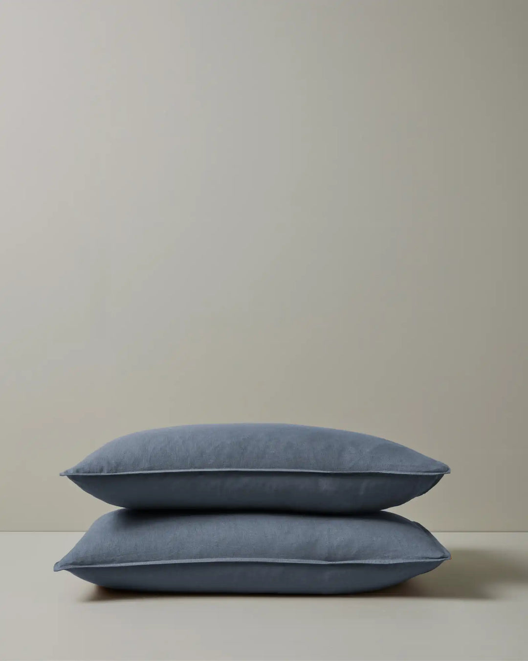 Ravello Pillowcase Set in denim, king size, stacked pair showing top-stitched flanged edge detail, European linen by Weave Home