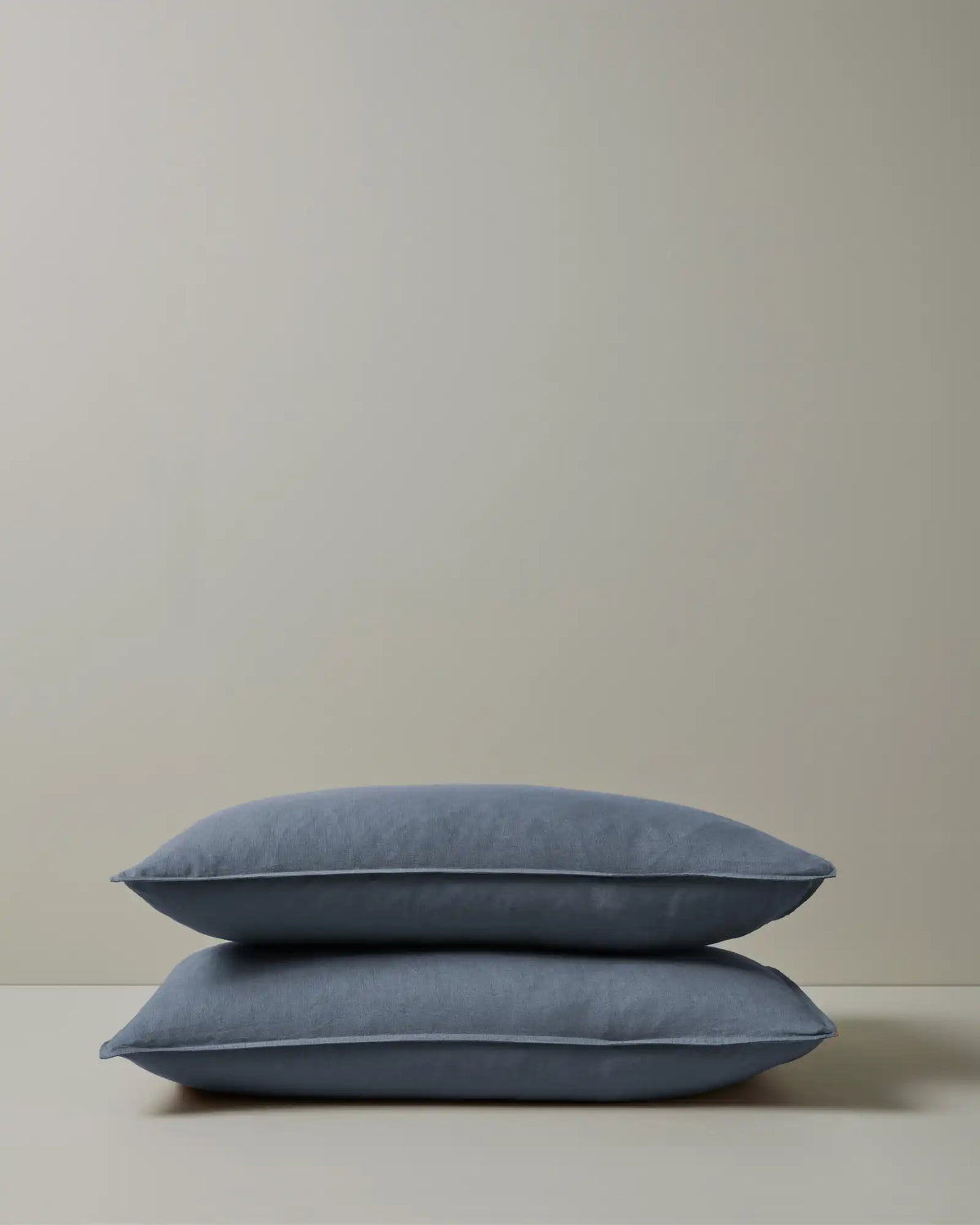 Ravello Pillowcase Set in denim, king size, stacked pair showing top-stitched flanged edge detail, European linen by Weave Home