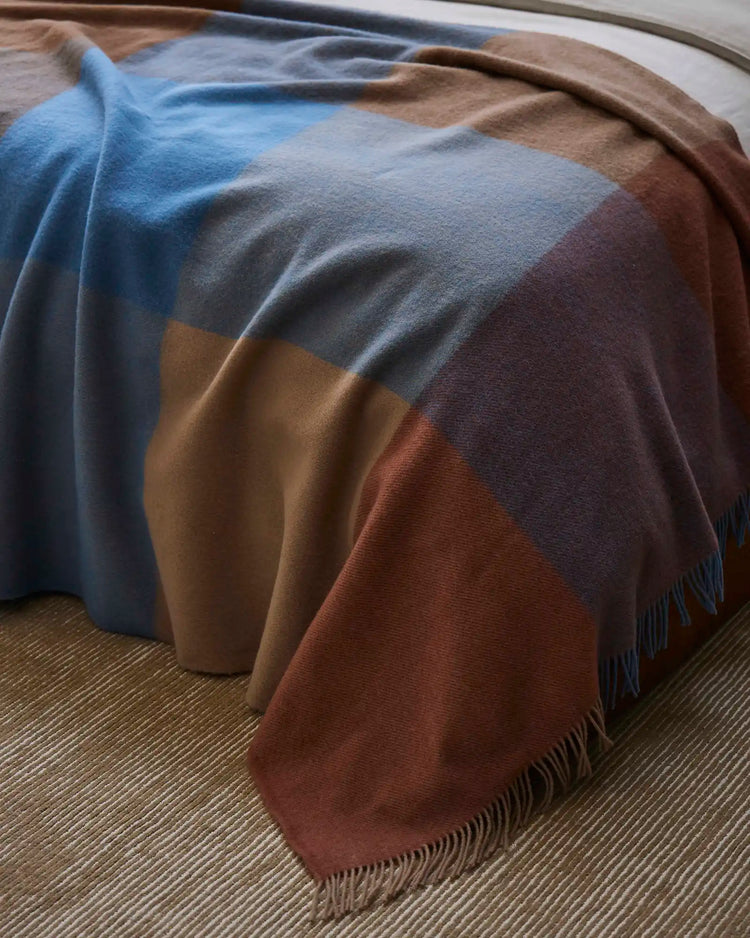 Brookside Ocean wool throw in cornflower blue, oak, rust and tan colourblock design with fringe edges by Weave Home