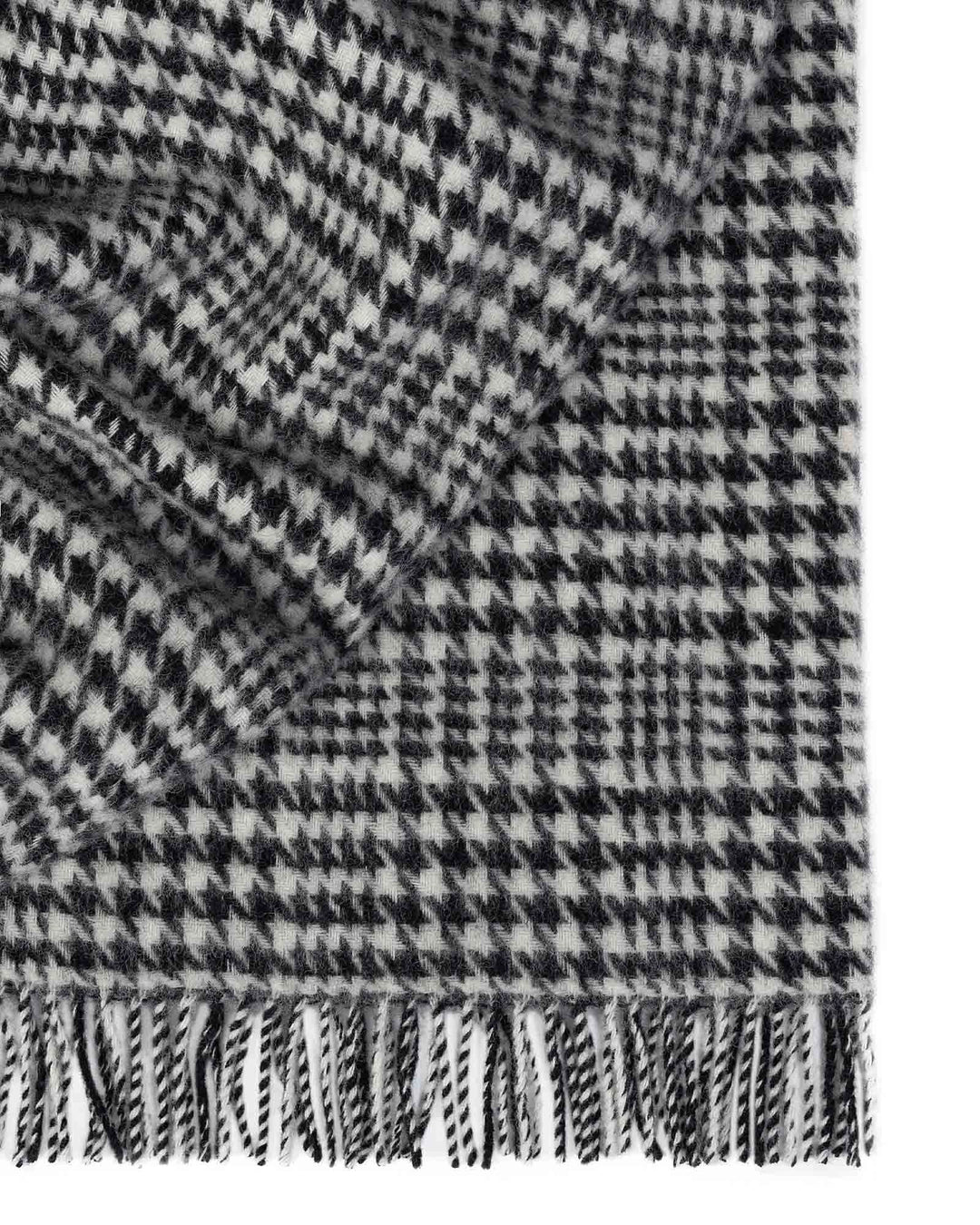 Helmsdale Midnight throw in black and white houndstooth check with fringed edge detail, 100% NZ wool by Weave Home