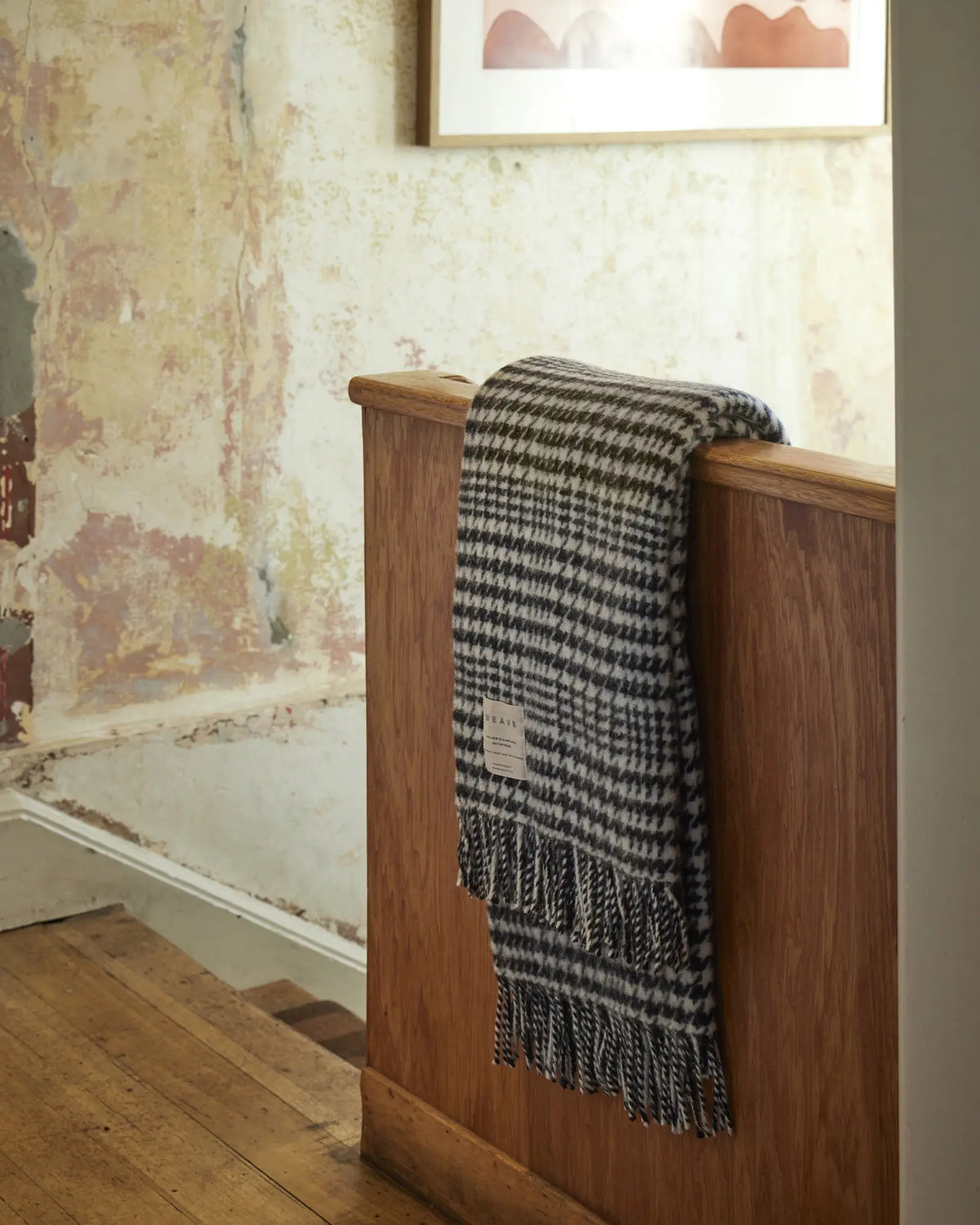 Helmsdale Midnight wool throw in black and white houndstooth check with fringed edge by Weave Home