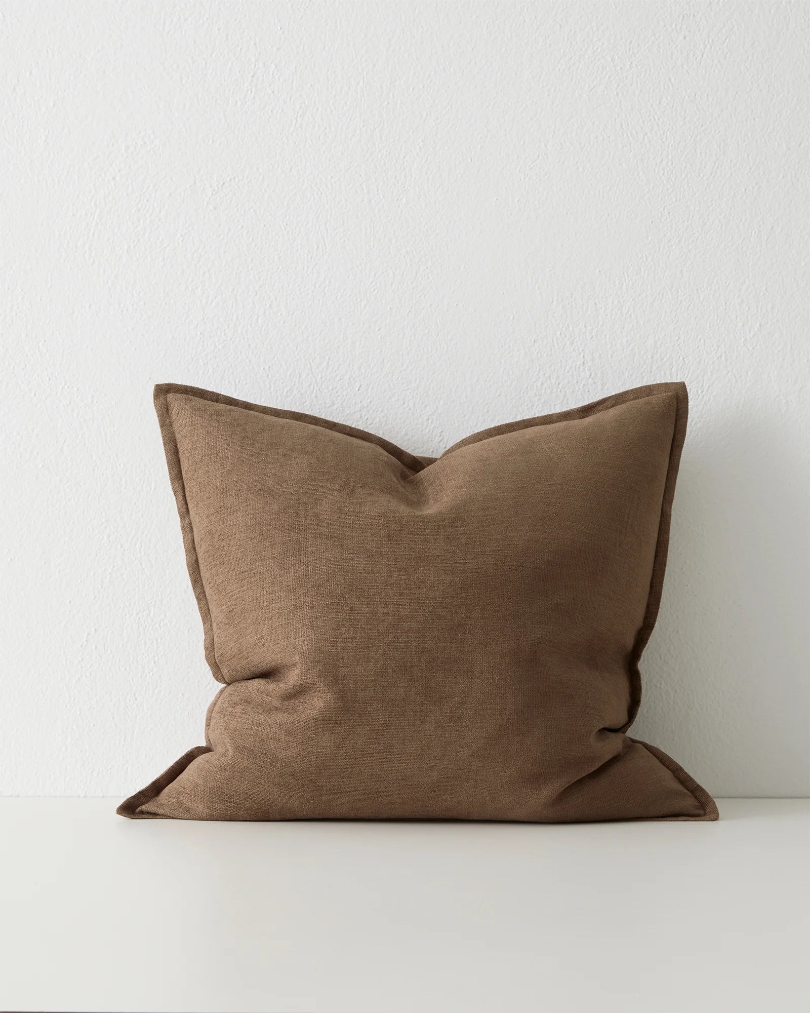 Fiore Toffee 50x50 cushion in warm linen viscose blend with piping detail, front view by Weave Home