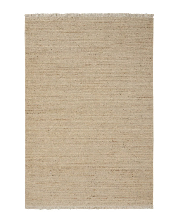 Anton Sand hand-woven wool rug with cut and loop pile, warm neutral with taupe and chocolate speckles, off-white cotton fringe by Weave Home