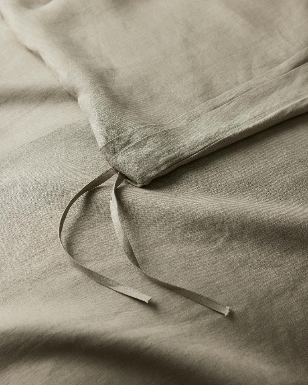 Ravello Quilt Cover in Caper, detail shot of internal tie closure on European linen, by Weave Home