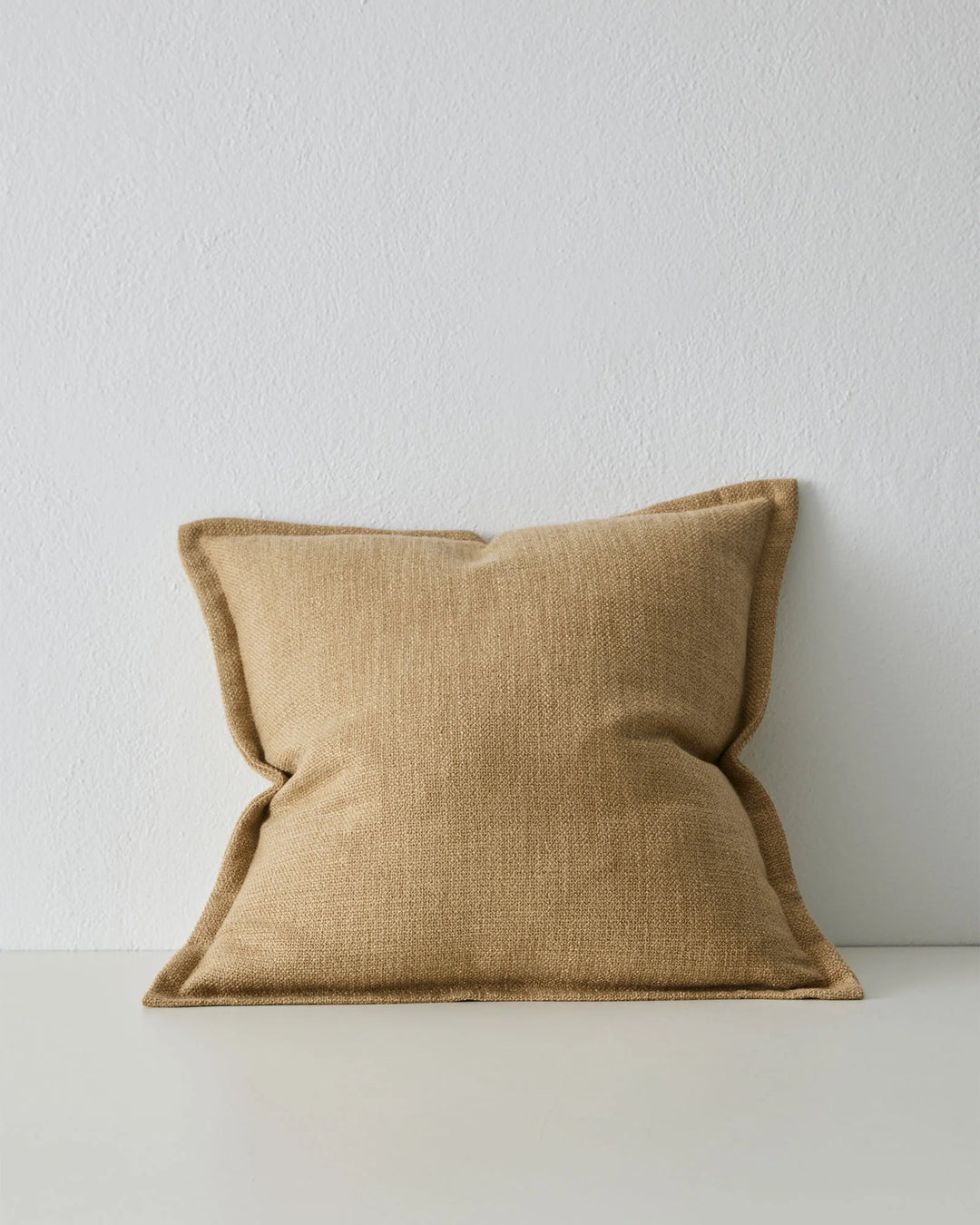 Figlio Sandstone 50x50 cushion in warm neutral tone with chunky woven texture and tailored border detail by Weave Home
