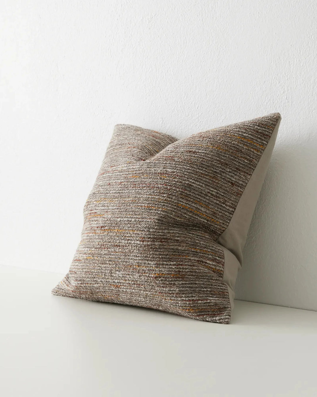 Vista Natural textured cushion with dry and soft bouclé yarns, 50x50cm linen polyester blend, side view by Weave Home
