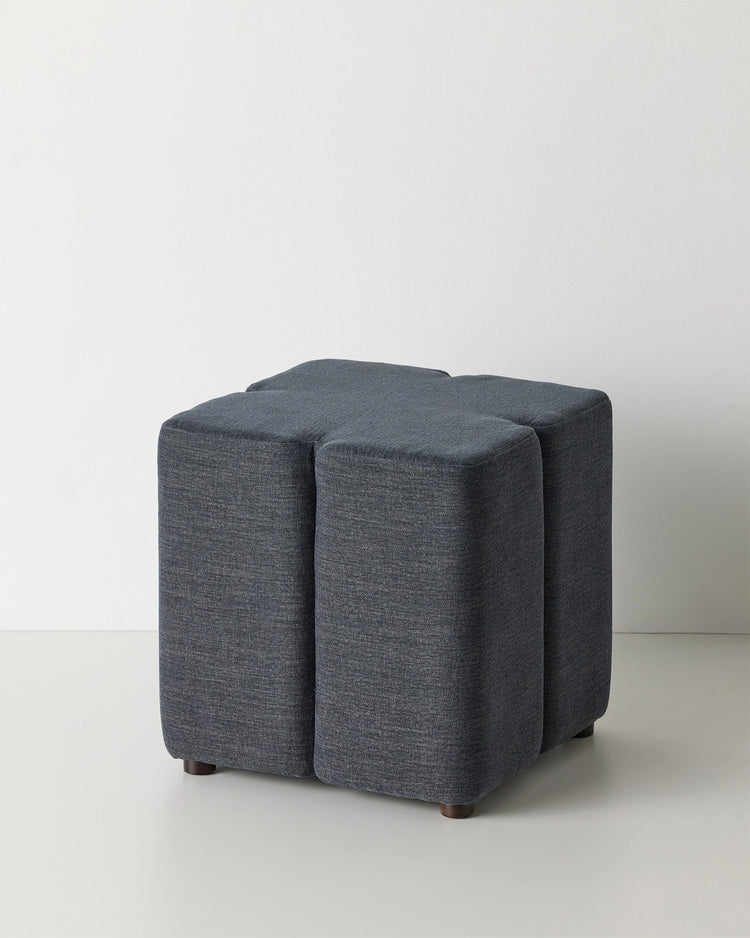 Campello Ocean ottoman in deep navy, front view, micro chenille upholstery with clover silhouette by Weave Home