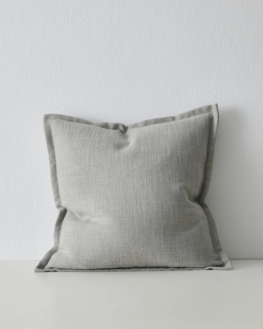 Figlio Mineral woven cushion in soft grey, 50x50cm, with chunky textured weave and flanged edge by Weave Home