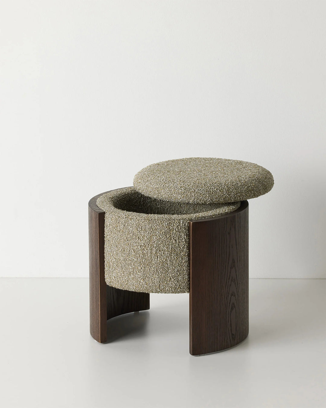 Norcia Moss ottoman with textured boucle upholstery and dark walnut ash wood legs, front view by Weave Home