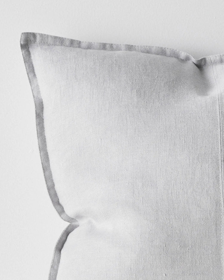 Como Silver linen cushion detail, showing stonewashed European linen with contrast piping edge, by Weave Home