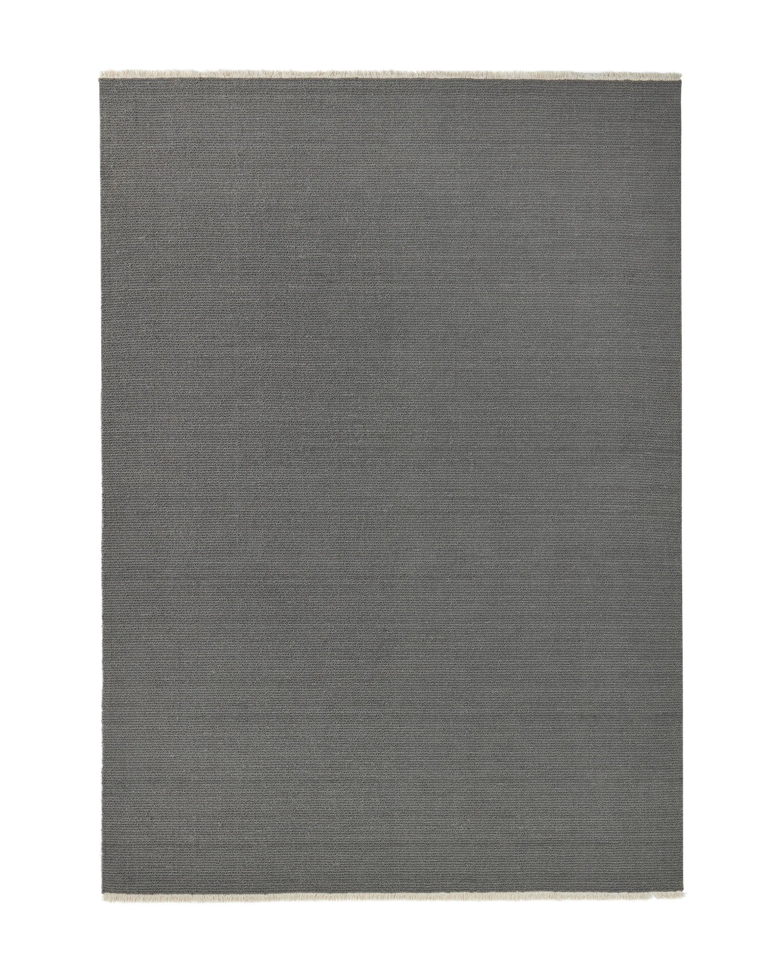 Fabien Echo textured wool rug in medium grey with cream fringe border, chunky ribbed weave loop pile by Weave Home